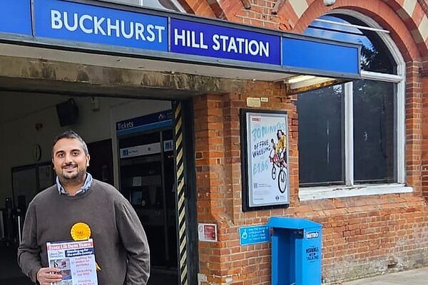 Rahim Hussein in front of the entrance of Buckhurst Hill tube station