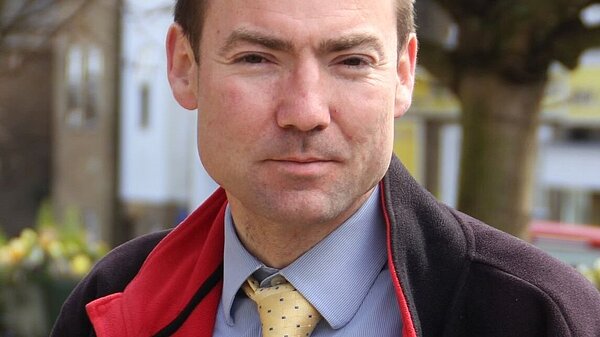 Jon Whitehouse in a shirt and tie in Queens Road Buckhurst Hill
